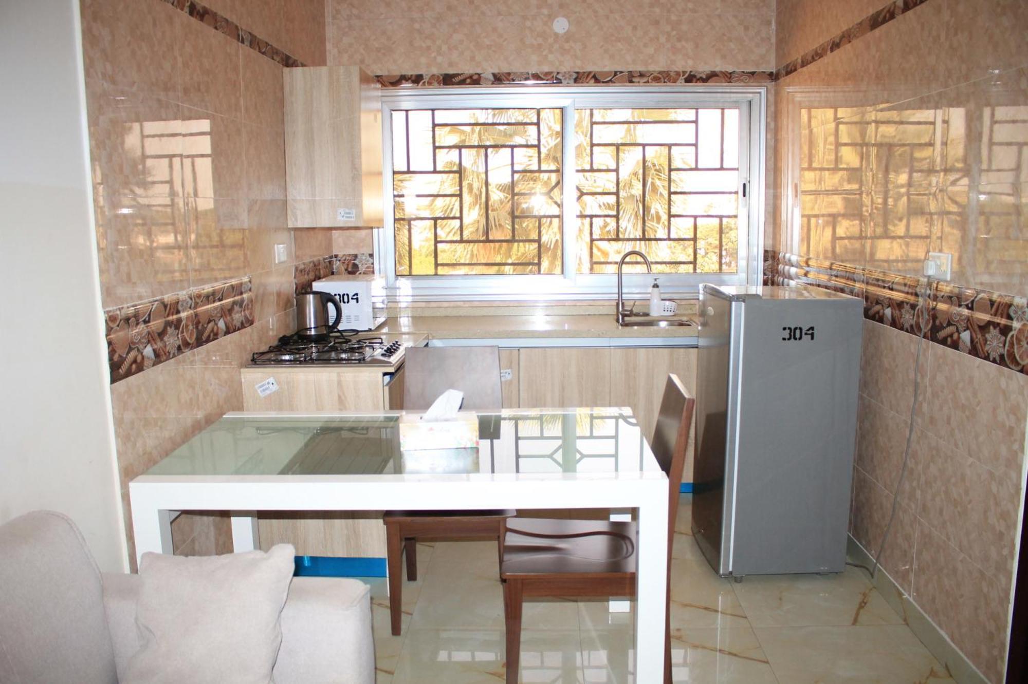 Akkwa Suites Official Serrekunda Buitenkant foto
